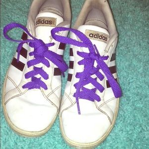 Adidas tennis shoe , purple lace size 5